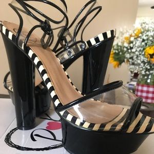 Black platform sandals, clear straps
